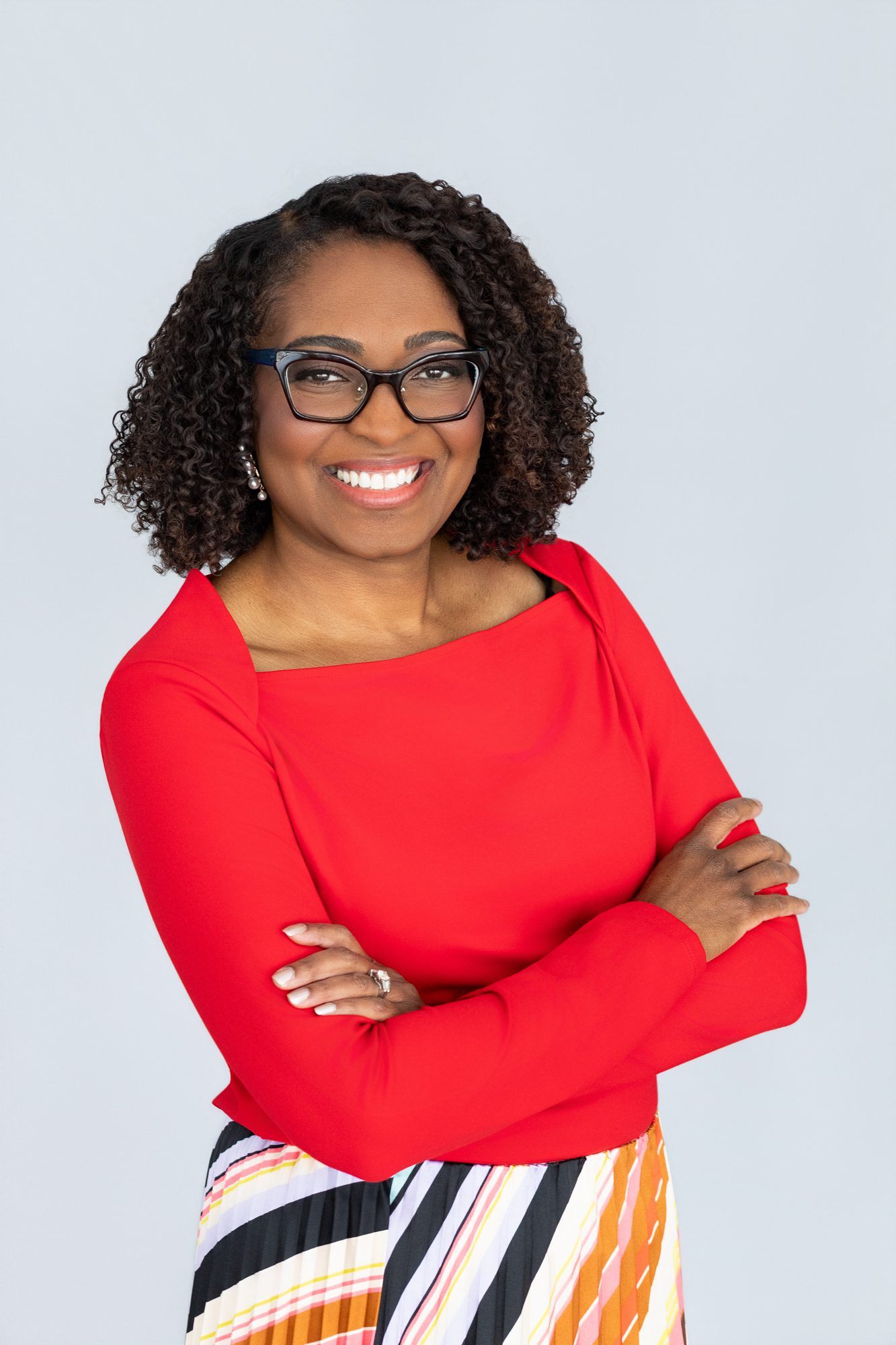 headshot of a successful black woman who is a doctor.